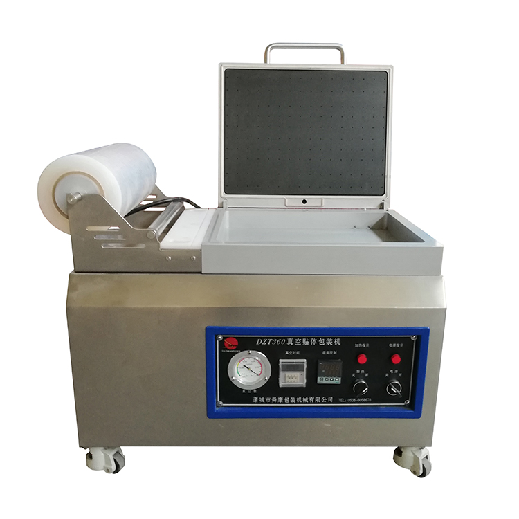 DZT360真空貼體包裝機(jī)(圖1)